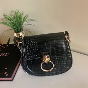 Crocodile embossed black handbag